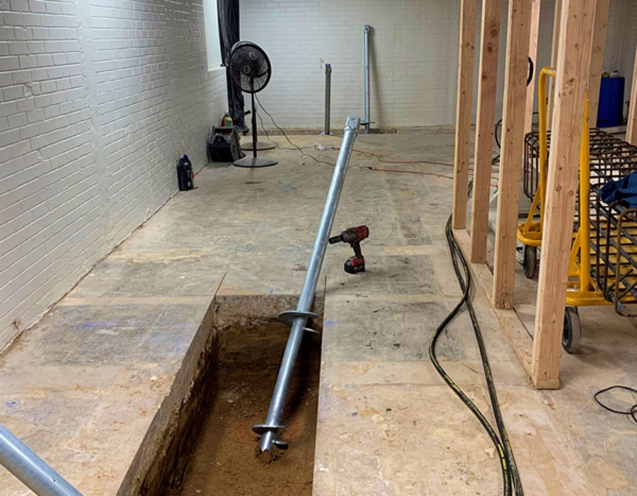 Commercial helical piles can be designed for compression, tension, uplift, and lateral load resistance. Their suitability depends on the structural loads, geotechnical conditions, corrosion exposure, installation access, and project-specific engineering requirements. Photo Credit: Elite Helical